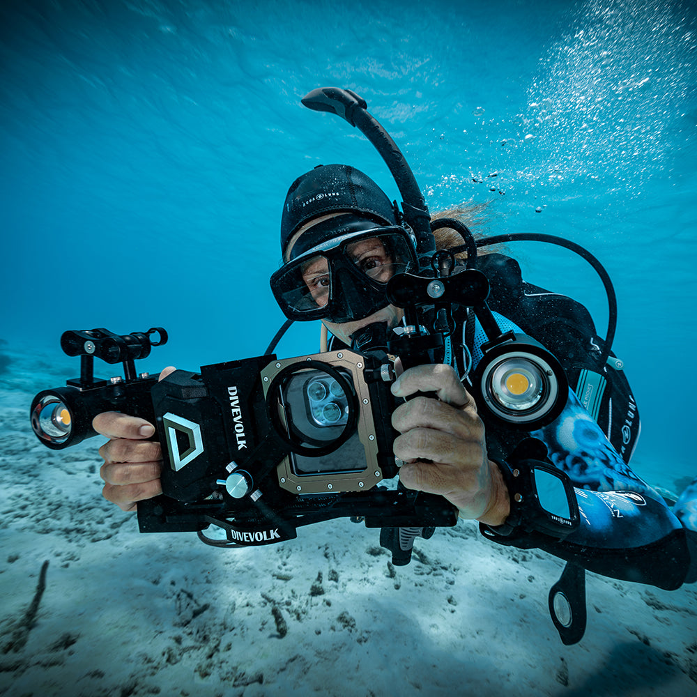 Diver uses DiveVolk SL50 underwater video light.